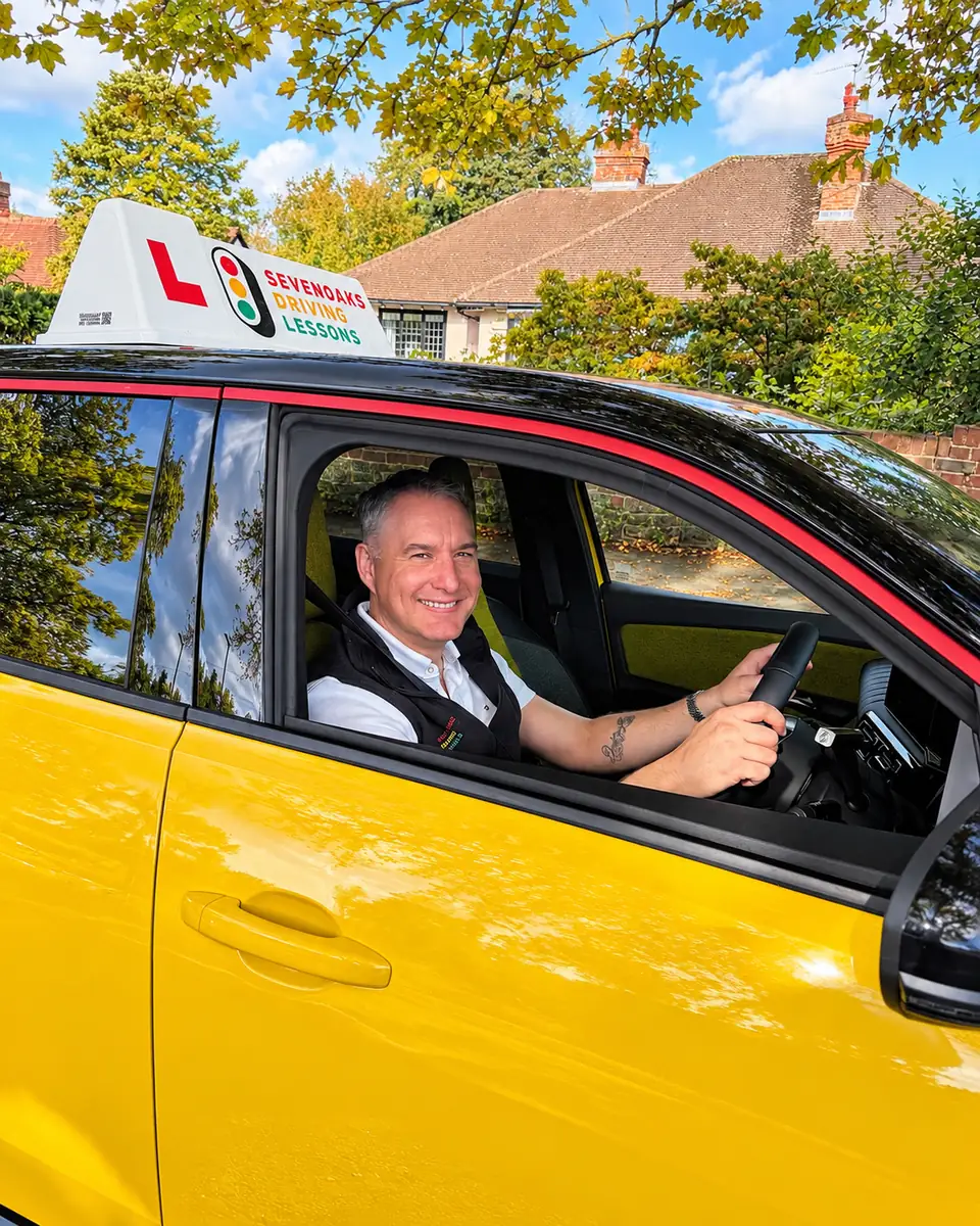 Geoff Newman with Rene, his electric Renault 5, in Sevenoaks